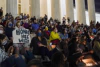 Crowds gather outside the Supreme Court following news of the death of Ruth Bader GinsburgAP