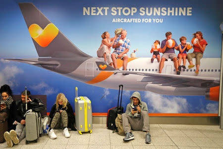 Passengers wait around in the South Terminal building at Gatwick Airport after drones flying illegally over the airfield forced the closure of the airport, in Gatwick, Britain, December 20, 2018. REUTERS/Peter Nicholls