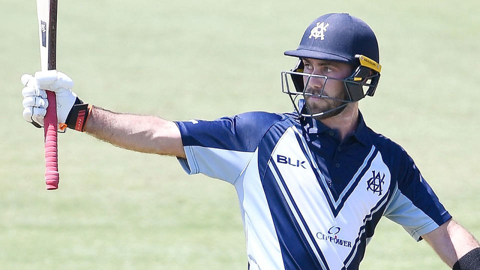 Glenn Maxwell raised his bat after scoring 50 runs but fell 20 short of a century. Pic: Getty