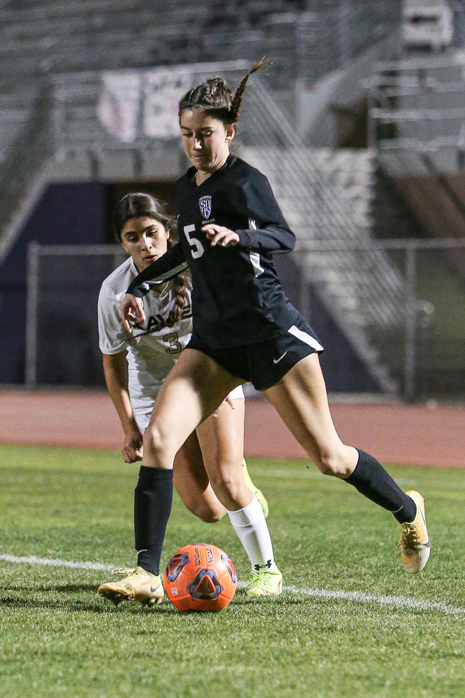 Natalie Hamilton (5) kicks the ball Thursday, Jan. 20, 2021 against Xavier Prep at Shadow Hills High School.