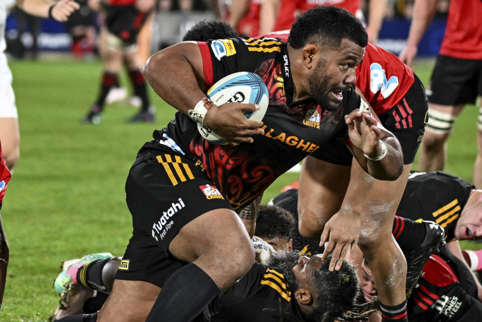 Samisoni Taukei'aho of the Chiefs makes a run during the Super Rugby Pacific final between the Chiefs and the Crusaders in Hamilton, New Zealand, Saturday, June 24, 2023. (Andrew Cornaga/Photosport via AP)