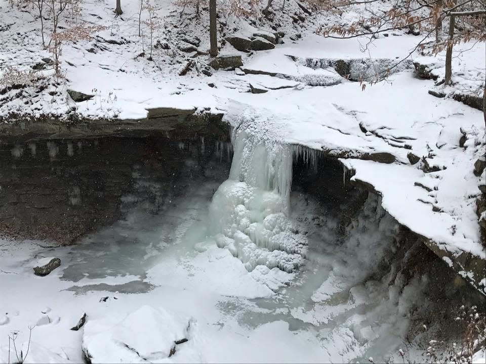 Waterfalls can be uniquely scenic in the winter when temperatures drop, including Blue Hen Falls at Cuyahoga Valley National Park.