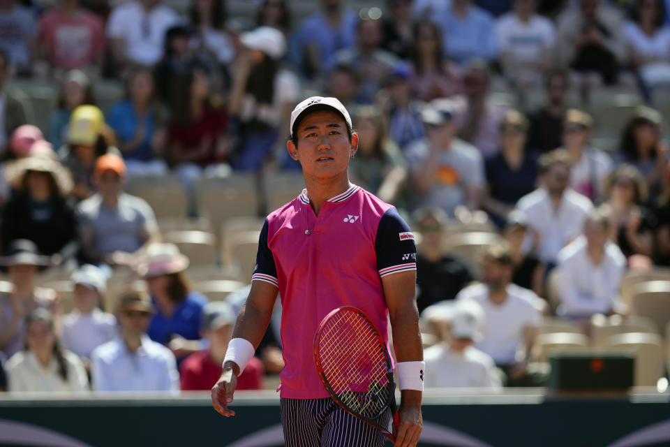 Japan's Yoshihito Nishioka looks on during his third round match of the French Open tennis tournament against Brazil's Thiago Seyboth Wild, at the Roland Garros stadium in Paris, Saturday, June 3, 2023. (AP Photo/Thibault Camus)