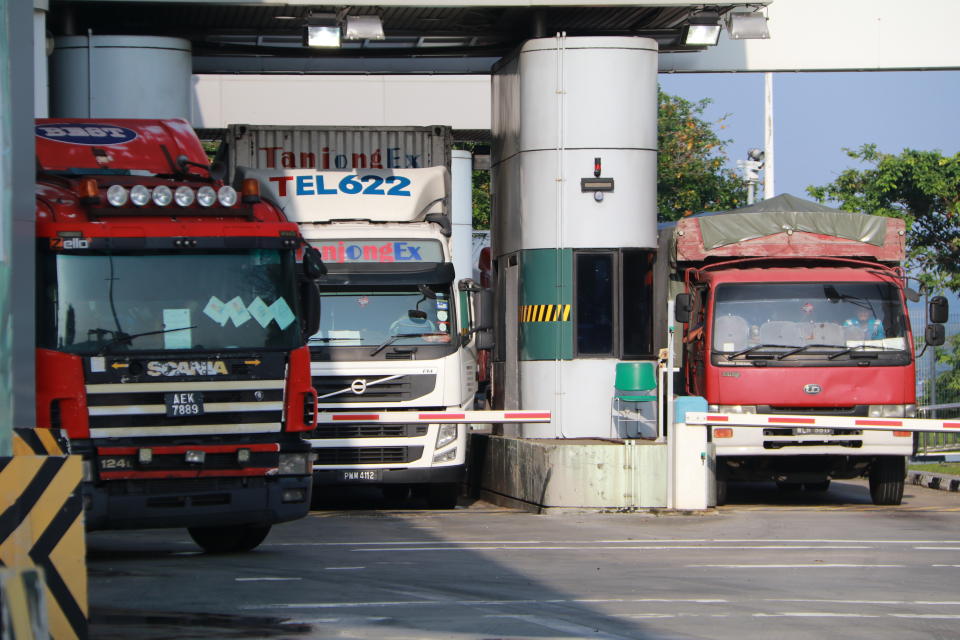 Delivery trucks at Tuas Checkpoint.