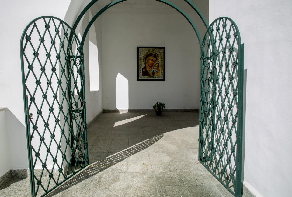 An entrance at the Russian Orthodox Cathedral in Havana, Cuba, Monday, Oct. 14, 2019. Russian-Cuban trade has more than doubled since 2013, to an expected $500 million this year, mostly in Russian exports to Cuba. (AP Photo/Ismael Francisco)