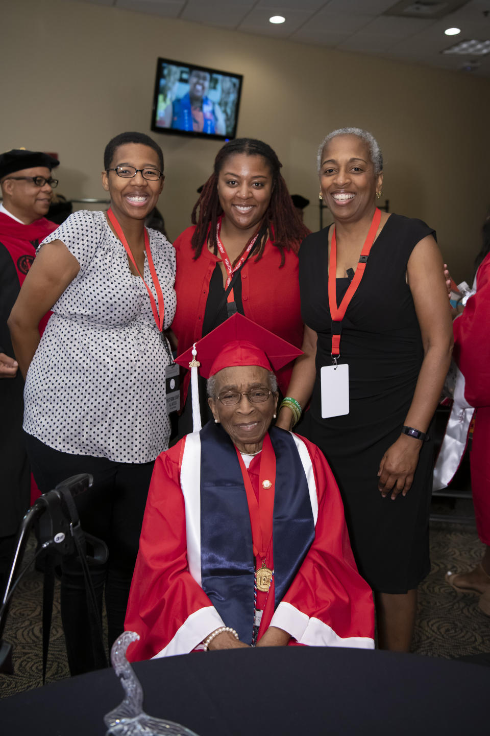 WSSU alumnus and WWII veteran Elizabeth Barker Johnson poses eith her daughter Cynthia Scott (right), and her two granddaughters, Shandra Bryant (left) and Tiffany Scott (center). (Credit: Winston-Salem State University)