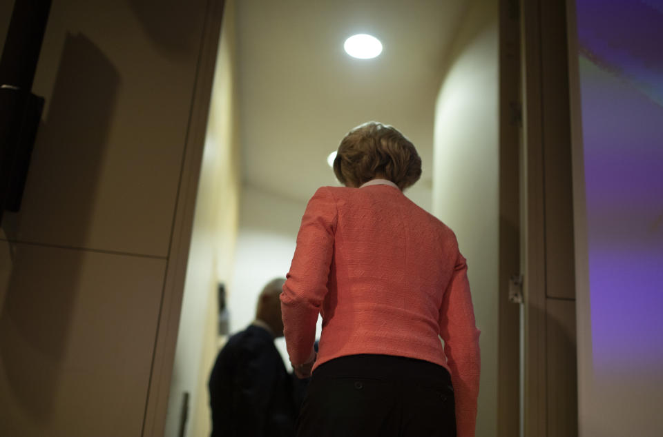 Incoming European Commission President Ursula von der Leyen leaves after addressing a media conference at EU headquarters in Brussels, Tuesday, Sept. 10, 2019. Incoming European Commission President Ursula von der Leyen on Tuesday unveiled her team of candidates for the EU commission. (AP Photo/Virginia Mayo)