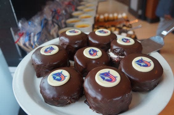 Chocolate-covered Hockey Pucks, a dessert mainstay at Nationwide Arena, have been retired this season by concession operator Delaware North. Fans will see a new, rotating lineup of sweet treats instead.
