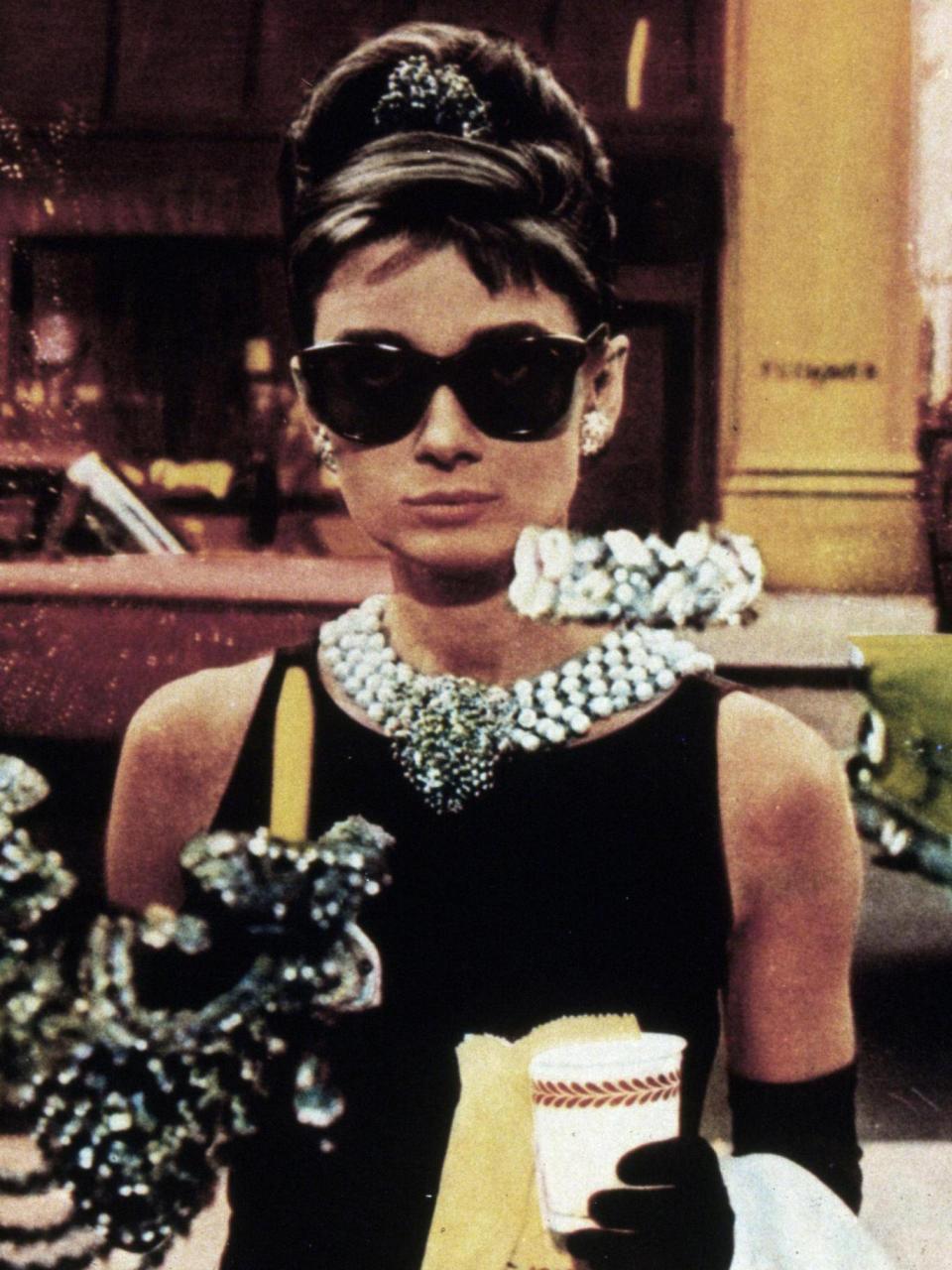 Audrey Hepburn as Holly Golightly, wearing Givenchy, in Breakfast at Tiffany's (Rex)