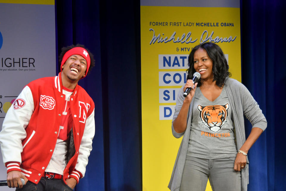 NEW YORK, NY - MAY 05:  Nick Cannon (L) and Former First Lady Michelle Obama speak onstage during MTV's 2017 College Signing Day With Michelle Obama at The Public Theater on May 5, 2017 in New York City.  (Photo by Mike Coppola/Getty Images for MTV)