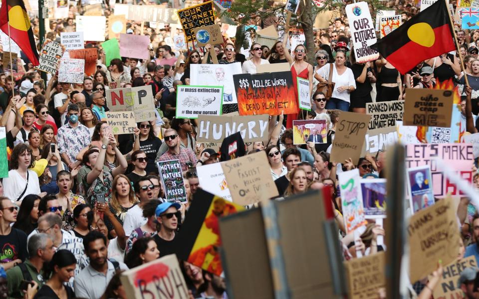 Thousands of people protested in Sydney on Saturday over the government's handling of the fires - Bloomberg