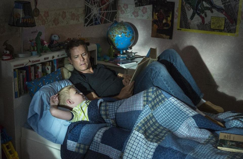 This image released by Sony Pictures shows Connor Corum, left, and Greg Kinnear in a scene from "Heaven Is For Real." (AP Photo/Sony Pictures, Allen Fraser)