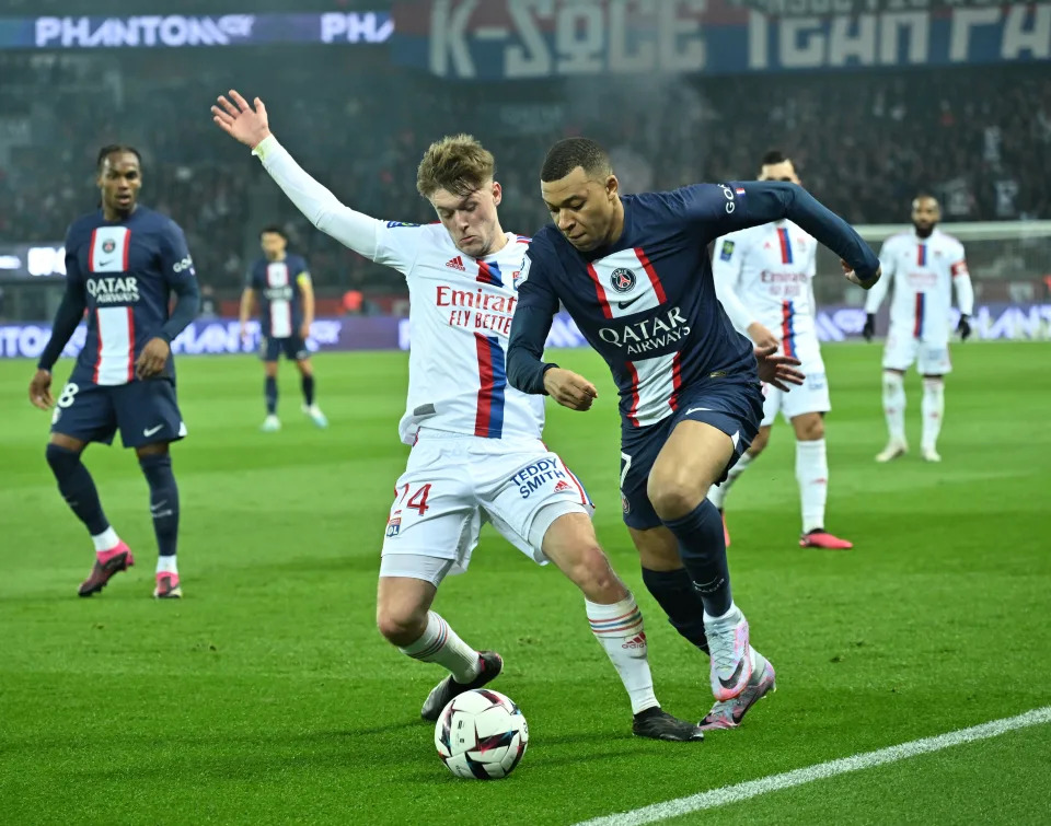 PARIS, FRANCE - APRIL 02: Kylian Mbappe (L) of Paris Saint - Germain in action during the French Ligue 1 (L1) soccer match between Paris Saint-Germain (PSG) and Olympique Lyonnais (OL) at Parc des Princes stadium in Paris, France on April 02, 2023. (Photo by Mustafa Yalcin/Anadolu Agency via Getty Images)