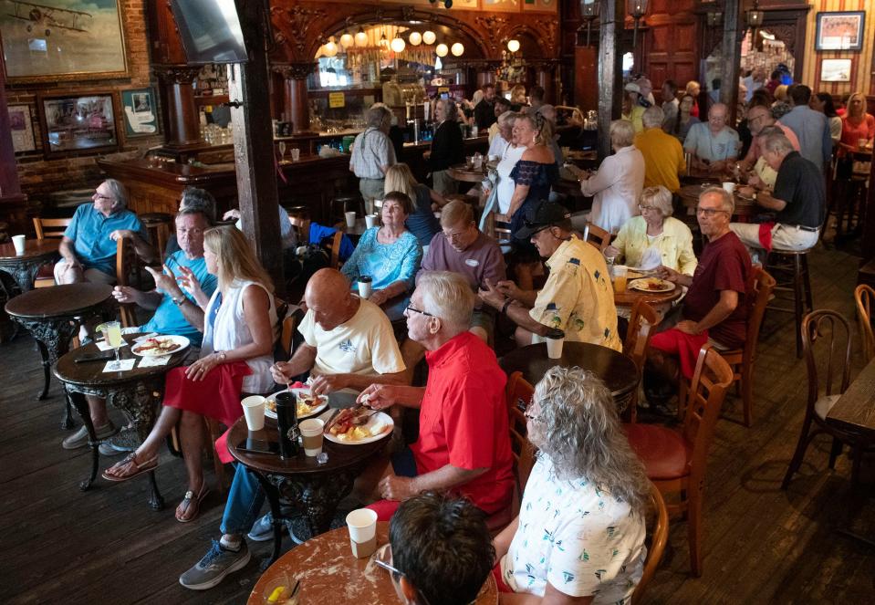 Dozens of sailing enthusiasts gathered at the downtown Pensacola entertainment complex for a watch party featuring the sailing team competing in Vilanova i la Geltru, Spain.