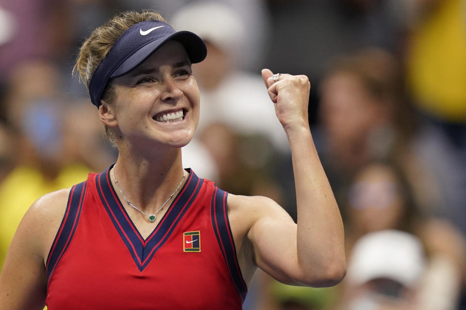 Elina Svitolina, of Ukraine, reacts after defeating Simona Halep, of Romania, during the fourth round of the US Open tennis championships, Sunday, Sept. 5, 2021, in New York. (AP Photo/Seth Wenig)