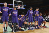 The Phoenix Mercury stand and kneel for the National Anthem before the game against the New York Liberty during Round Two of the 2016 WNBA Playoffs on September 24, 2016 at Madison Square Garden in New York City, New York. (Photo by David Dow/NBAE via Getty Images)