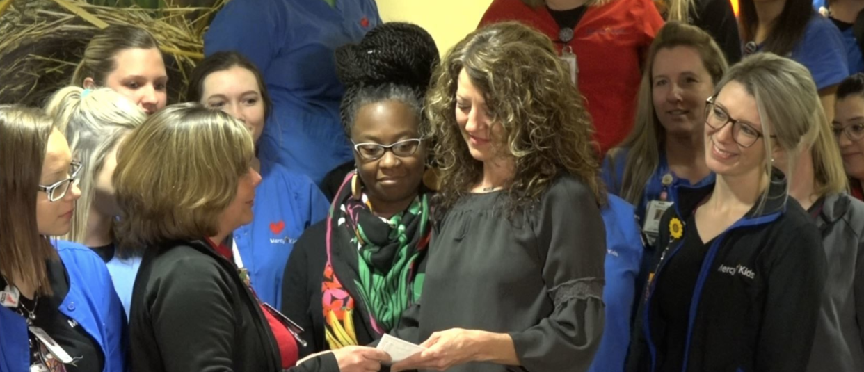 Nurses at Mercy Children’s Hospital in St. Louis pooled their Mega Millions winnings and gave it to two deserving co-workers. (Photo: KMOV)