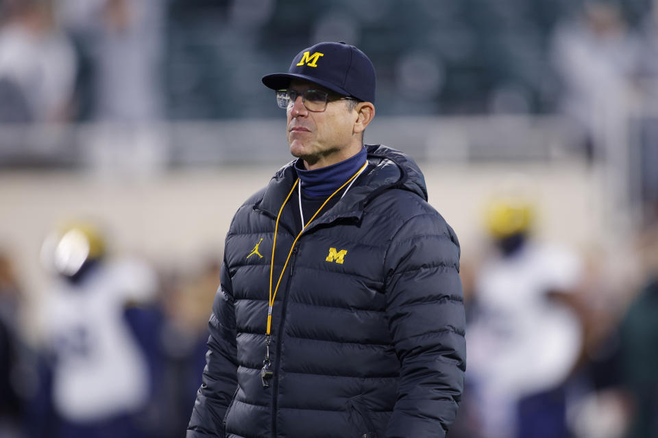 Michigan coach Jim Harbaugh will be back on his team's sideline after serving a three-game suspension. (AP Photo/Al Goldis)