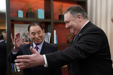 U.S. Secretary of State Mike Pompeo escorts Vice Chairman of the North Korean Workers' Party Committee Kim Yong Chol, North Korea's lead negotiator in nuclear diplomacy with the United States, into talks aimed at clearing the way for a second U.S.-North Korea summit as they meet at a hotel in Washington, U.S., January 18, 2019. REUTERS/Joshua Roberts