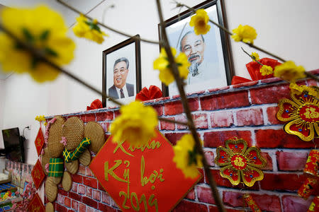 Portraits of late leaders North Korea's leader Kim Il and Vietnamese Ho Chi Minh hangs in a wall at the Vietnam-North Korea Friendship kindergarten, founded by North Korean Government in Hanoi, Vietnam February 13, 2019. REUTERS/Kham