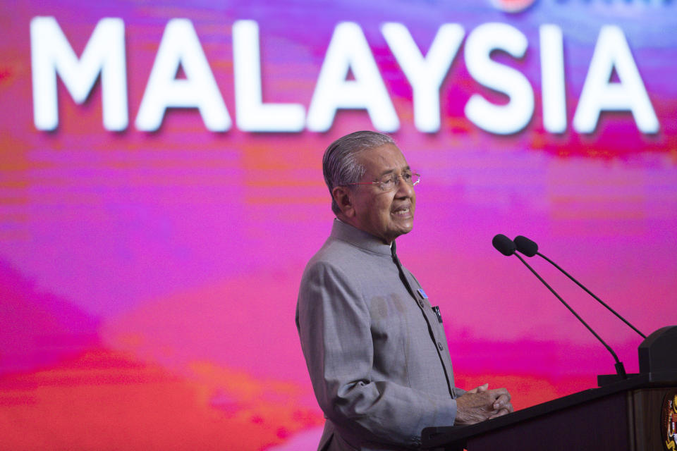 FILE - Malaysian Prime Minister Mahathir Mohamad speaks during a press conference in Putrajaya, Malaysia on May 9, 2019. At 97, Mahathir is back again in the election race as the head of a new ethnic Malay alliance that he calls a "movement of the people." He hopes his bloc could gain enough seats in Nov. 19 polls to be a powerbroker. (AP Photo/Vincent Thian, File)