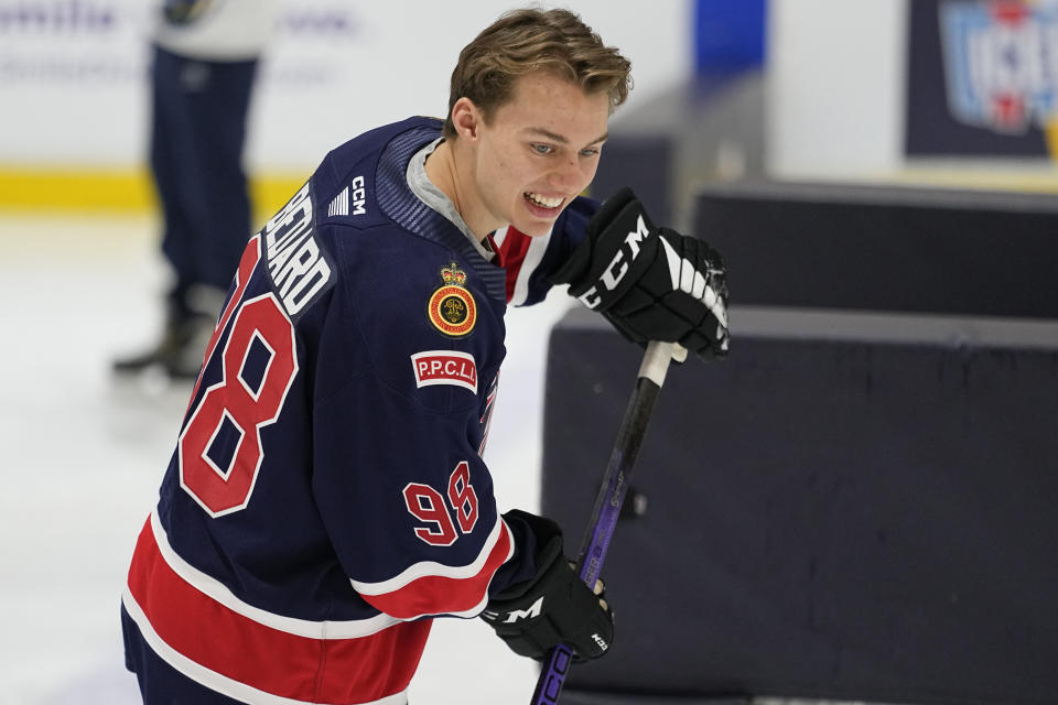 NHL draft prospect Connor Bedard skates across the ice during a youth hockey clinic with other draft prospects and members of the NHL Player Inclusion Coalition, Tuesday, June 27, 2023, in Nashville, Tenn. (AP Photo/George Walker IV)