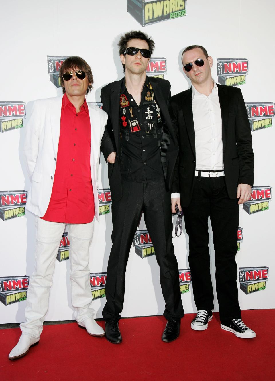 From left to right, Mani Mountfield, Bobby Gillespie and Martin Duffy of Primal Scream arrive at the Shockwaves NME Awards 2007 at the Hammersmith Palais on March 1, 2007 in London.