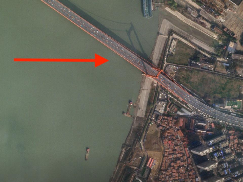 A satellite image shows traffic on the Yingwuzhou Yangtze River Bridge in Wuhan, China, January 12, 2020, before the city is put under virtual lockdown due to the outbreak of the new coronavirus.