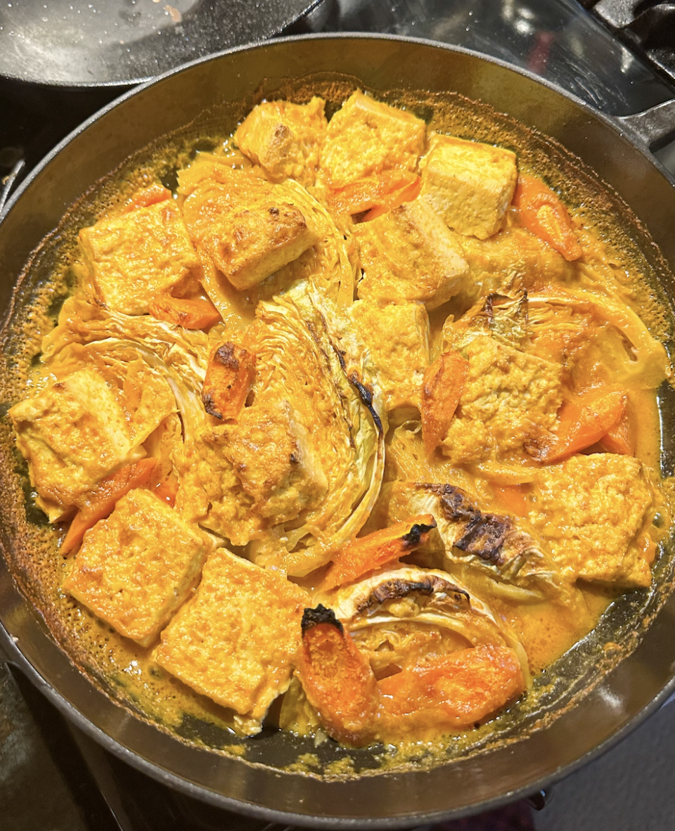 cabbage tofu and carrots in a curry sauce after baking