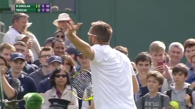 Troicki tells the umpire 