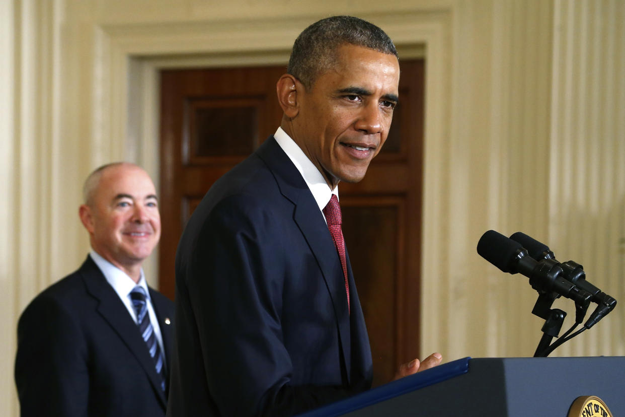 Then-Deputy Secretary of Homeland Security Alejandro Mayorkas stands by as former President Barack Obama delivers remarks at a naturalization ceremony for active duty service members and civilians at the White House in Washington July 4, 2014. (Jonathan Ernst/Reuters) 