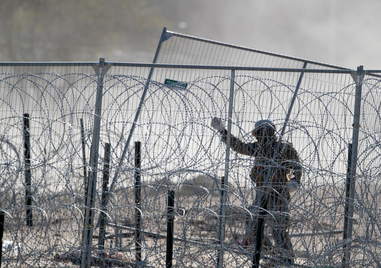 A Texas National Guard soldier puts in infrastructure in El Paso, Texas on April 26, 2024.