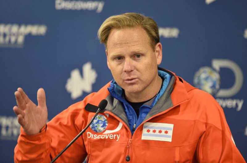 Nik Wallenda speaks at a news conference following his two successful, world-record setting high wire walks on November 2, 2014, in Chicago. On this day in 2013, Wallnda walked on a 2-inch thick cable across the Little Colorado River Gorge near the Grand Canyon in under 23 minutes. File Photo by Brian Kersey/UPI