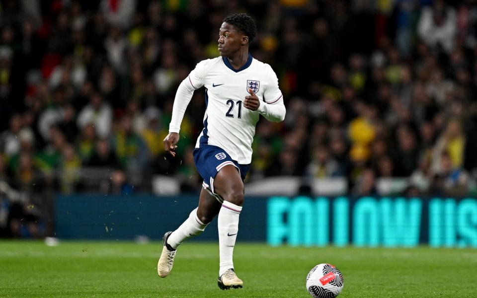 Kobbie Mainoo of England runs with the ball during the international friendly match between England and Brazil at Wembley Stadium on March 23, 2024 in London, England