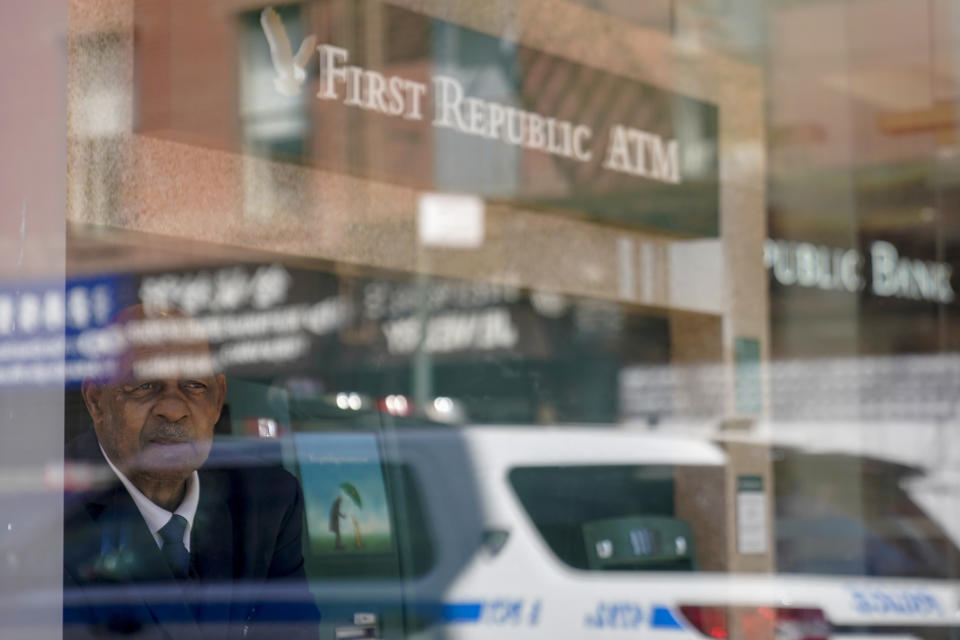 FILE - A security guard stands inside a First Republic Bank in the Chinatown neighborhood of Manhattan, March 16, 2023. Only 10% of U.S. adults say they have significant confidence in the nation’s banks and financial institutions, a new poll finds. That is down from the 22% who said they had high confidence in banks in 2020. The poll from the Associated Press-NORC Center for Public Affairs Research poll also finds that a majority of Americans say the government is not doing enough to regulate the industry. (AP Photo/Mary Altaffer, File)