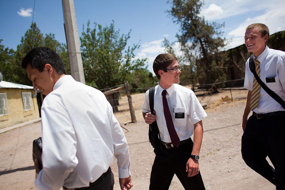 Latter-day Saints missionaries walk to Sunday lunch in Colonia Juarez, Mexico, in July 2011. <a href="https://www.gettyimages.com/detail/news-photo/from-left-mormon-missionaries-elder-gil-elder-moak-and-news-photo/119786889?adppopup=true" rel="nofollow noopener" target="_blank" data-ylk="slk:Dominic Bracco II/Prime For The Washington Post via Getty Images;elm:context_link;itc:0;sec:content-canvas" class="link ">Dominic Bracco II/Prime For The Washington Post via Getty Images</a>