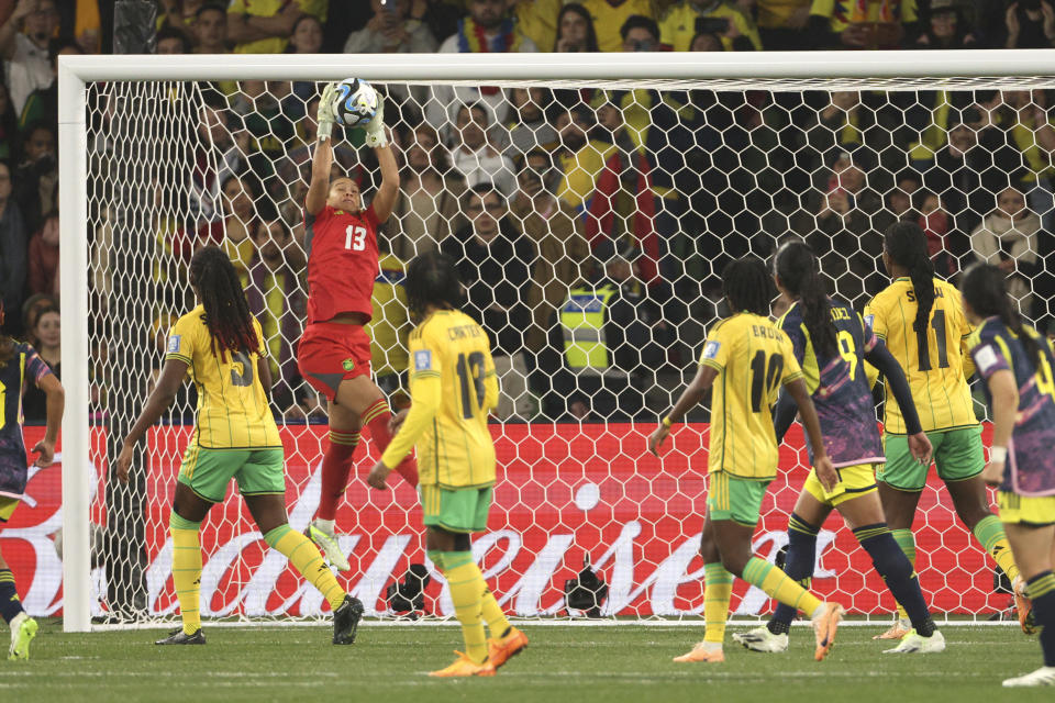 Jamaica's goalkeeper Rebecca Spencer saves a ball during the Women's World Cup round of 16 soccer match between Jamaica and Colombia in Melbourne, Australia, Tuesday, Aug. 8, 2023. (AP Photo/Hamish Blair)