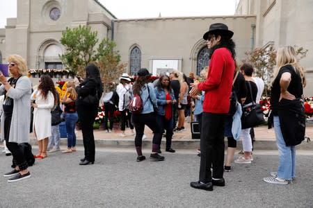 Fans gather at Forest Lawn Cemetery ten years after the death of child star turned King of Pop, Michael Jackson, in Glendale, California