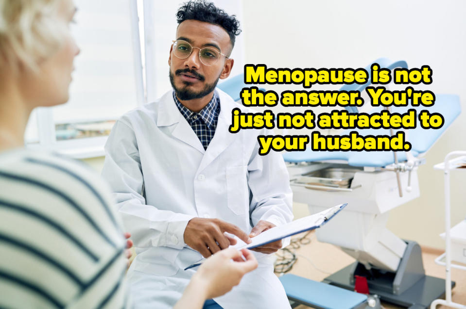 A male obgyn reading a chart to his patient