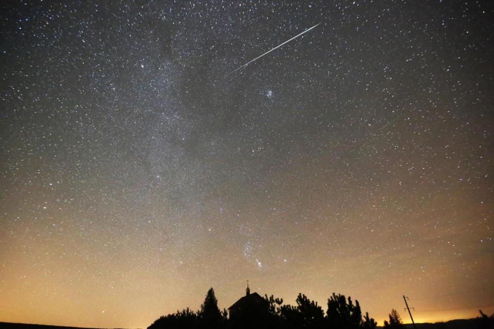 A meteor captured flying through the sky in Belarus (EPA)