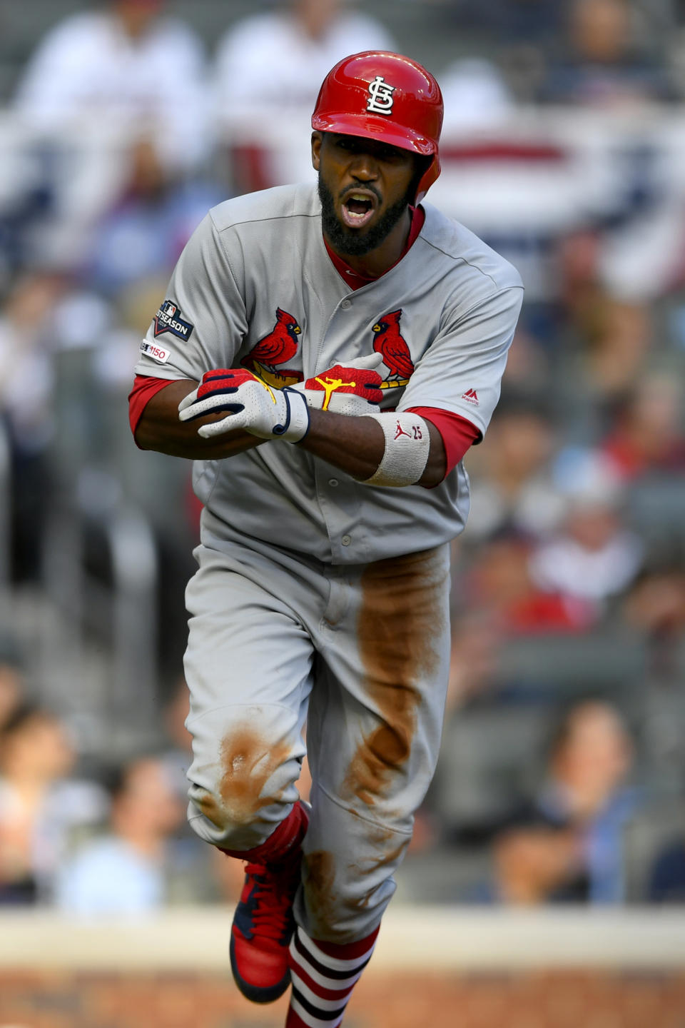 St. Louis Cardinals' Dexter Fowler hits a three-run double during the first inning of Game 5 of their National League Division Series baseball game against the Atlanta Braves, Wednesday, Oct. 9, 2019, in Atlanta. (AP Photo/John Amis)