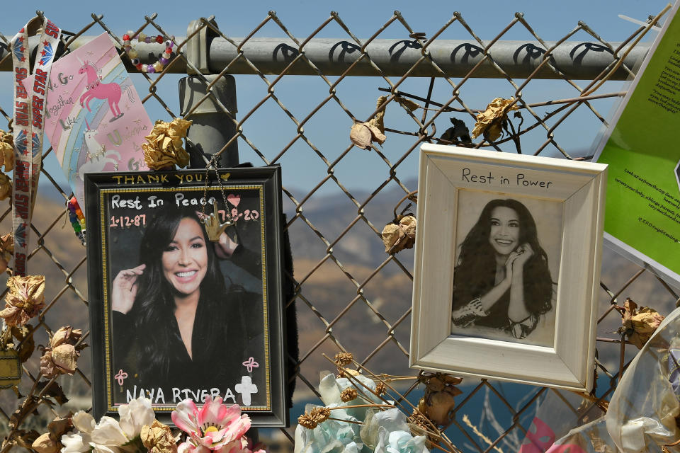 PIRU, CALIFORNIA - AUGUST 03:  A memorial set up by fans to honor actress Naya Rivera at Lake Piru, where Rivera's death was ruled an accidental drowning, on August 3, 2020 in Piru, California. Rivera was declared missing July 8 after her four-year-old son, Josey, was found alone on a boat she had rented. Her body was recovered by search and rescue workers at Lake Piru on July 13.  (Photo by Amy Sussman/Getty Images)