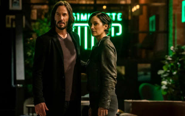 Keanu Reeves and Carrie-Ann Moss in "The Matrix Resurrections"<p>Warner Bros./Village Roadshow</p>