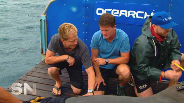 Sam with the shark he named for the OCEARCH team