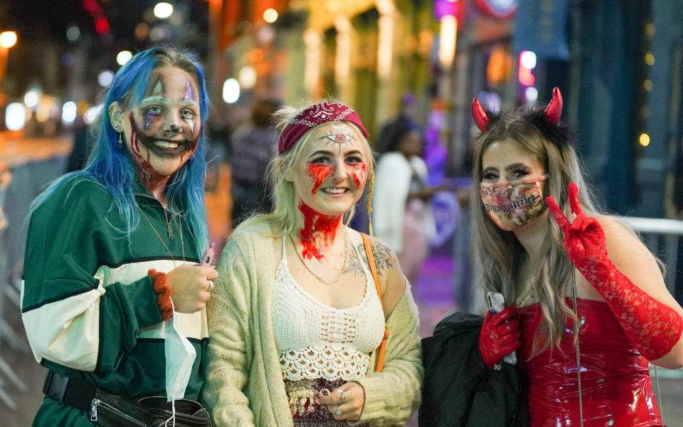 Â© Licensed to London News Pictures 23/10/2020. Sheffield , UK. Revellers in Halloween costumes enjoy a night out in Sheffield city centre before new restrictions come into force in South Yorkshire. The county of South Yorkshire will enter into Tier 3 ,from 00:01 am on Saturday 24 October. New restrictions will cover Sheffield, Barnsley, Doncasterand Rotherham. Photo credit: Ioannis Alexopoulos/LNP - Ioannis Alexopoulos/LNP