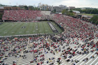 Georgia fans in red fill the majority of the seats in the first half of an NCAA college football game against Vanderbilt Saturday, Sept. 25, 2021, in Nashville, Tenn. (AP Photo/Mark Humphrey)