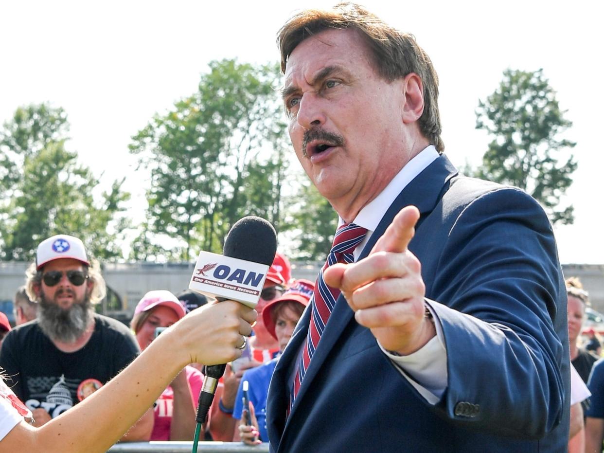 Mike Lindell being interviewed by OAN at a Trump rally.