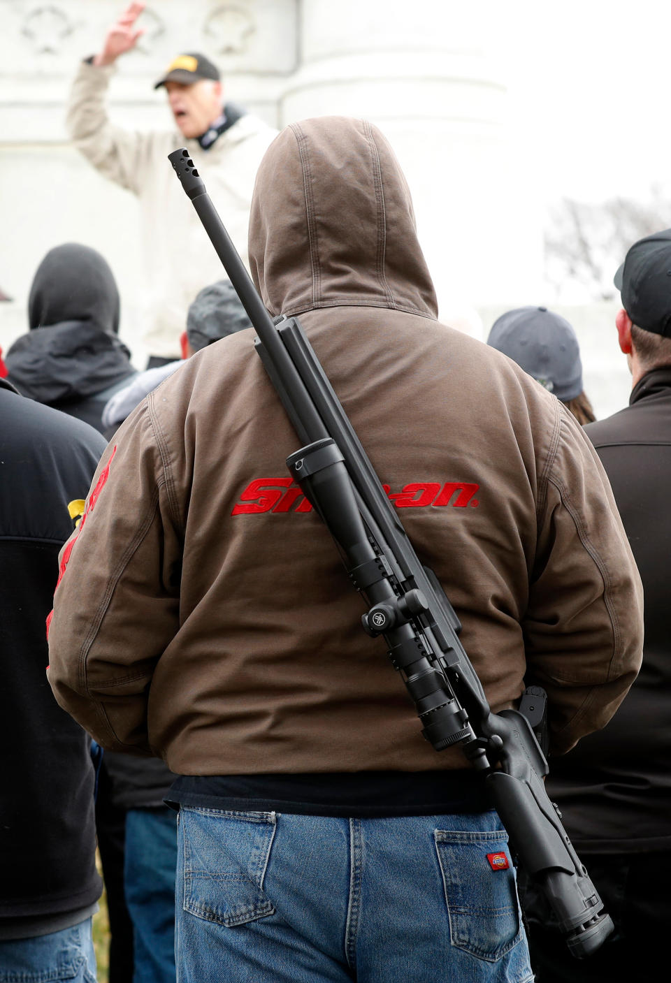 <p>A rally attendee listens to a speaker during a gun-rights rally at the state capitol, Saturday, April 14, 2018, in Des Moines, Iowa. (Photo: Charlie Neibergall/AP) </p>