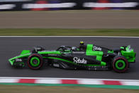 Sauber driver Zhou Guanyu of China steers his car during the qualifying session at the Suzuka Circuit in Suzuka, central Japan, Saturday, April 6, 2024, ahead of Sunday's Japanese Formula One Grand Prix. (AP Photo/Hiro Komae)