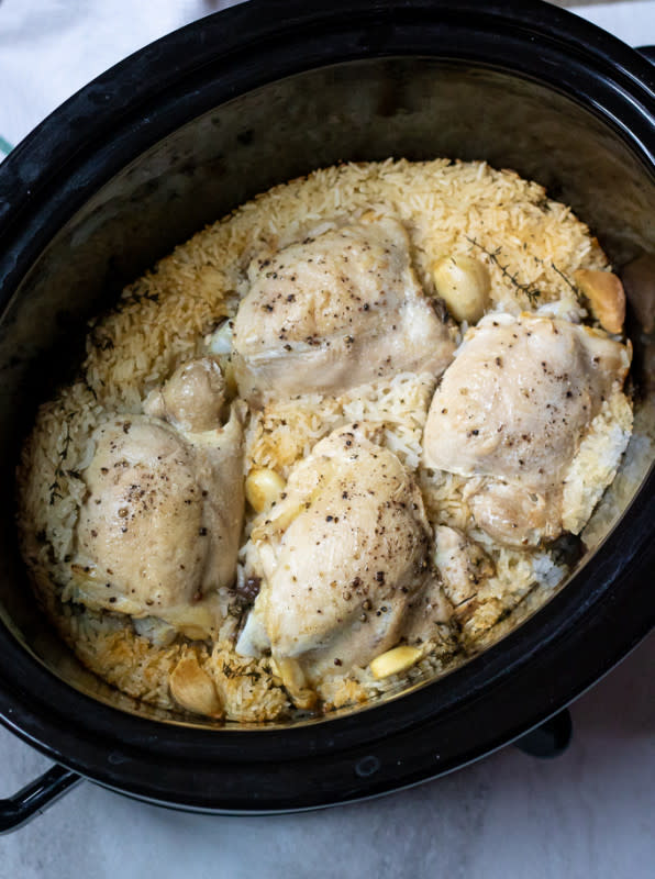 <p>Cook your chicken and rice meal right in the crockpot with plenty of lemon, garlic, and thyme. Get this <a href="https://amindfullmom.com/slow-cooker-lemon-garlic-chicken-rice/" rel="nofollow noopener" target="_blank" data-ylk="slk:Slow Cooker Lemon Garlic Chicken and Rice;elm:context_link;itc:0;sec:content-canvas" class="link rapid-noclick-resp">Slow Cooker Lemon Garlic Chicken and Rice</a> recipe!</p>